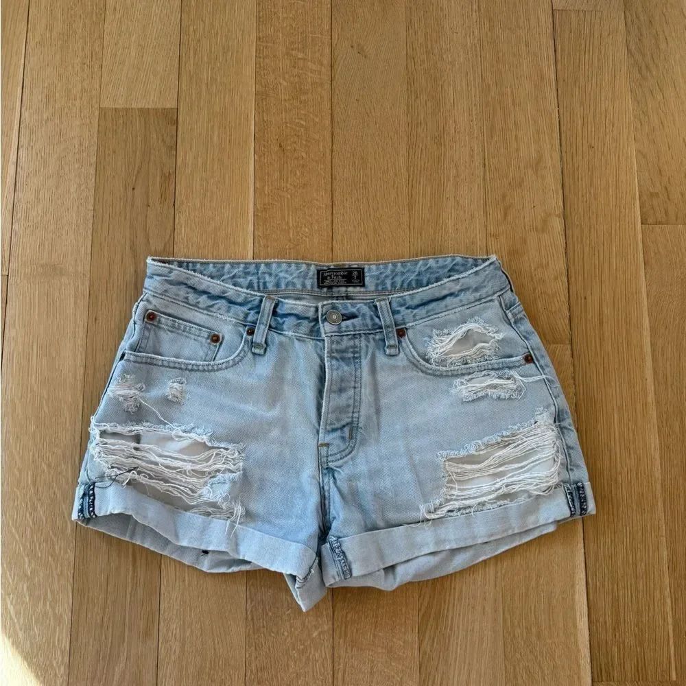 Distressed Light Blue Denim Shorts